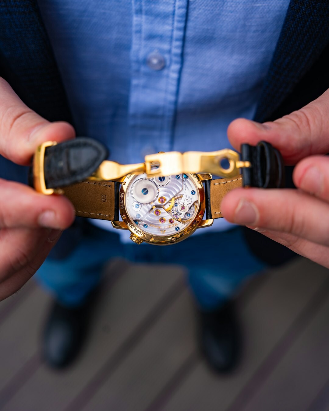 artisan crafting luxury watch
