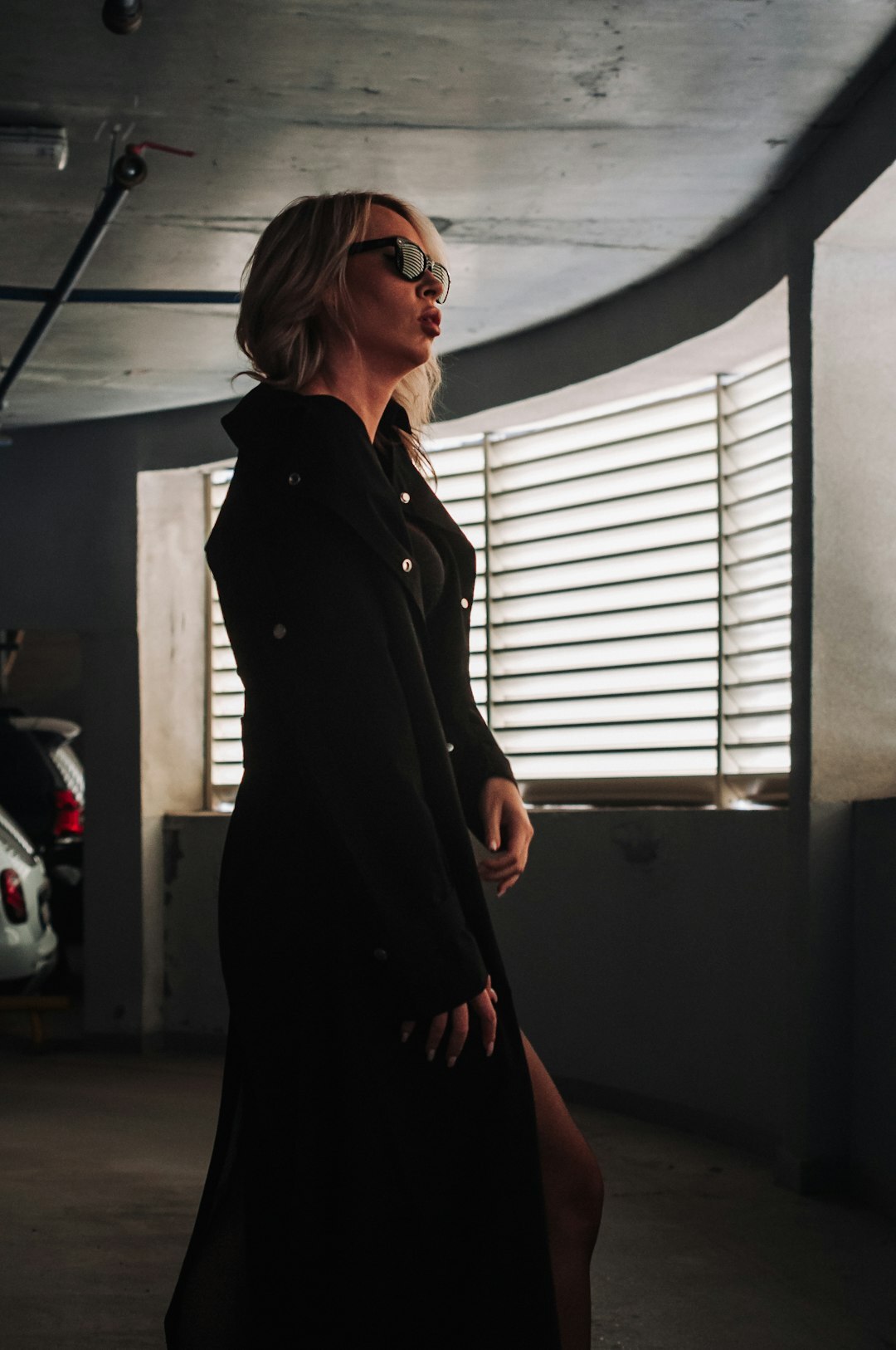 elegant woman trying on luxury coat